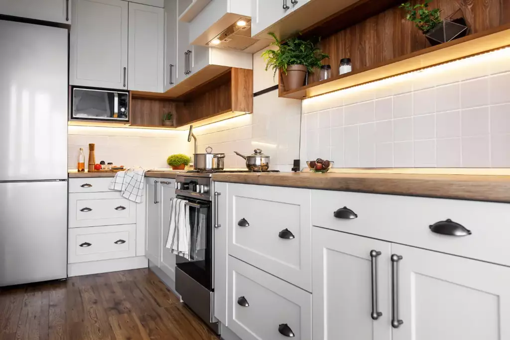 Scandinavian kitchen with sleek white cabinets, perfect for buying kitchen cabinets for compact spaces